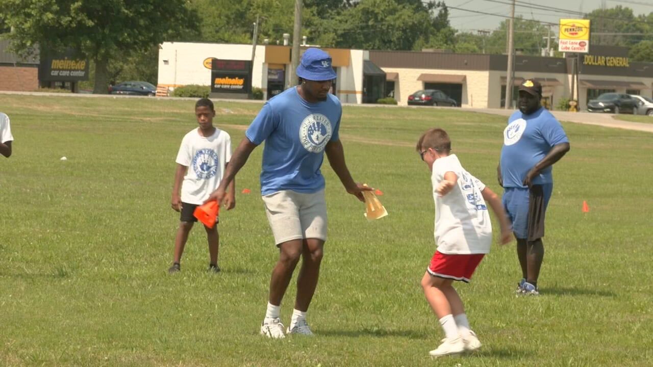 Cats, Cards coach local kids at J.J. Weaver's Perfect Fit Football Camp